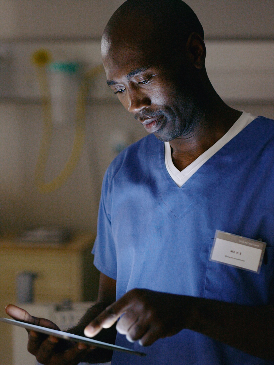 Man on tablet in hospital